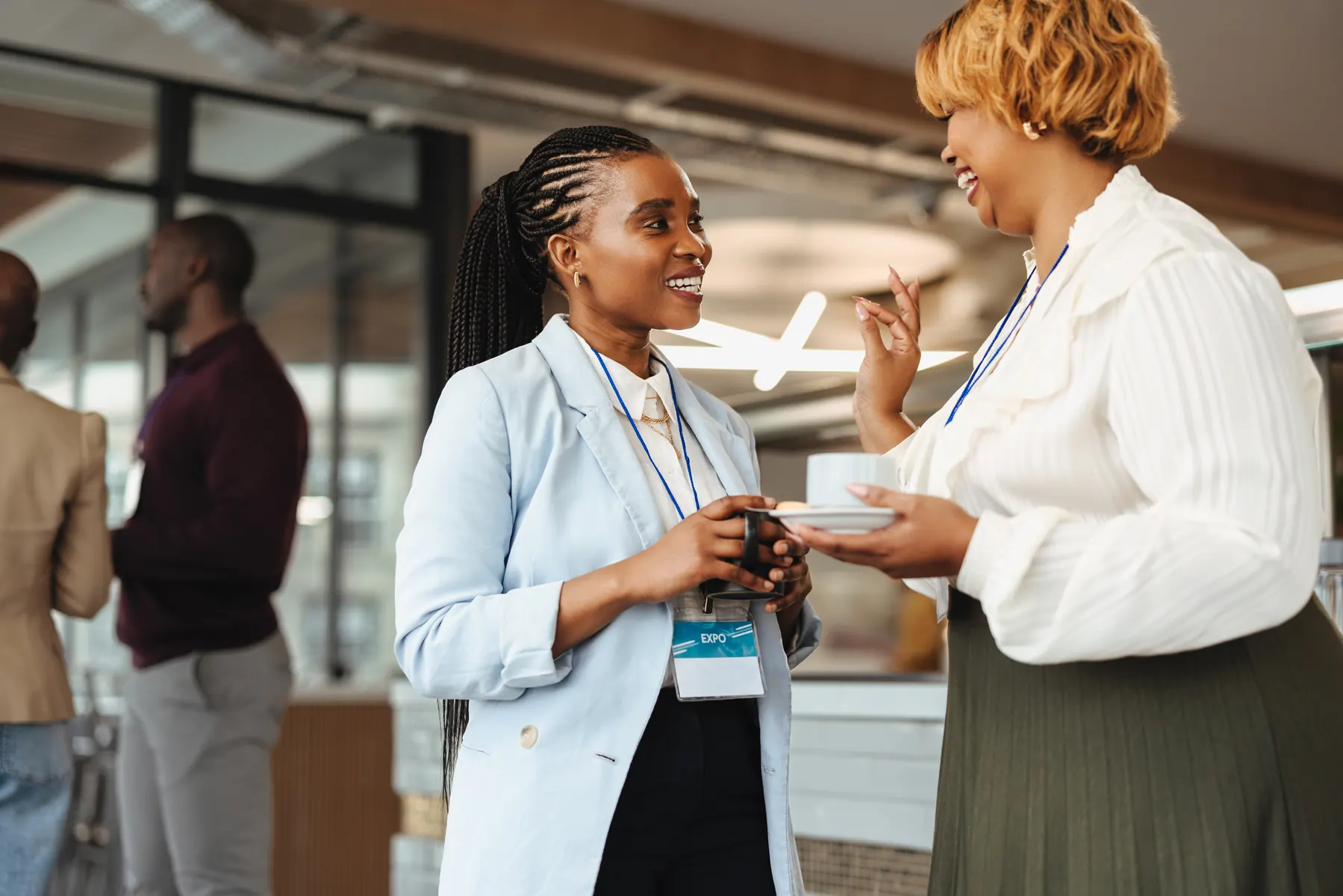Two businesswomen in conversation at the office
